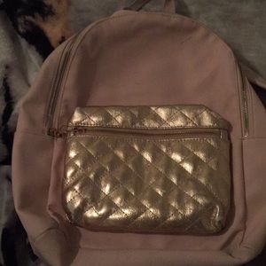 A bright pink backpack